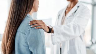 A doctor comforting her patient, photo by PeopleImages/Getty Images
